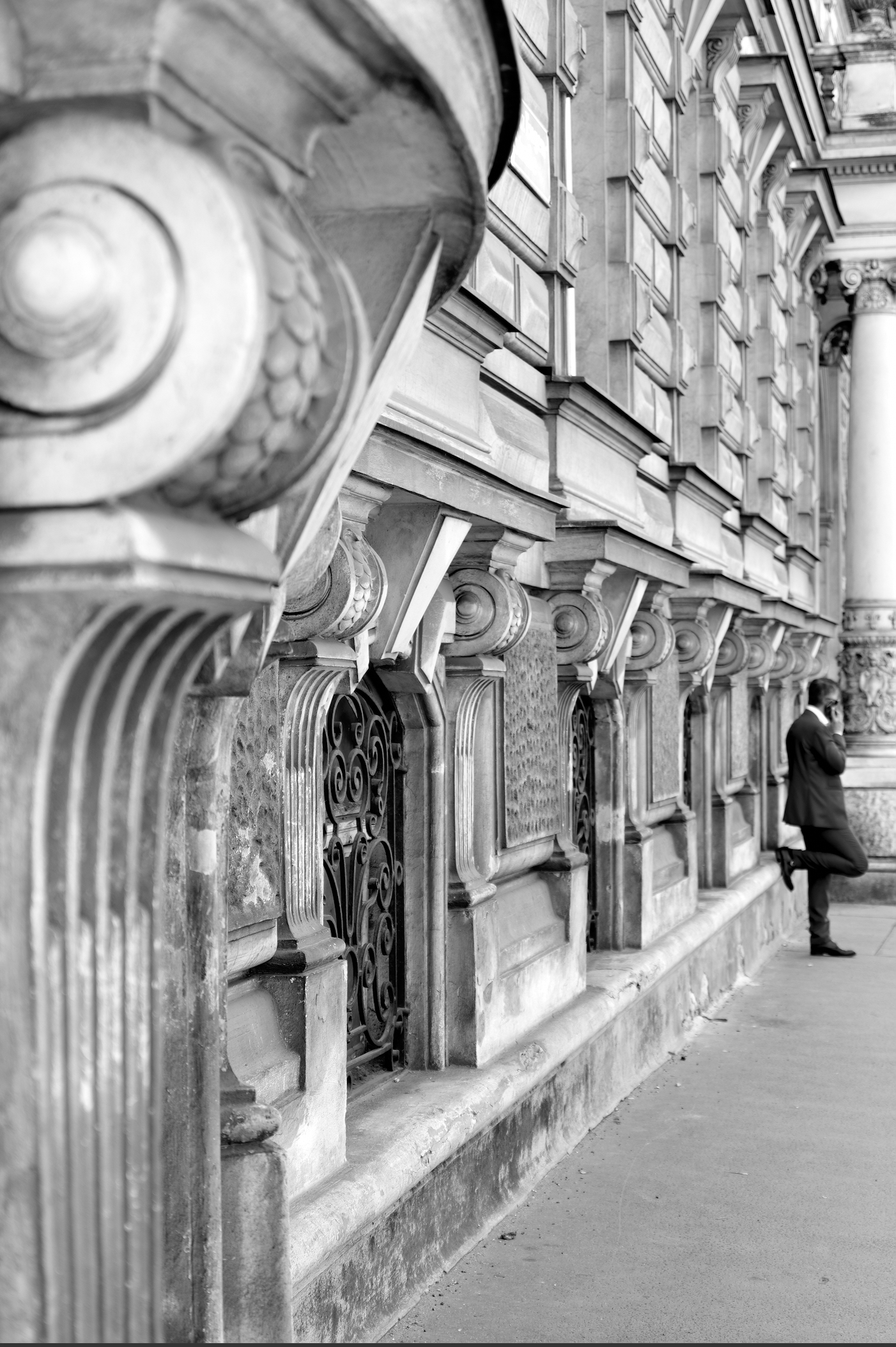 Phone Call, Vienna — a woman on a mobile phone on a Vienna street.