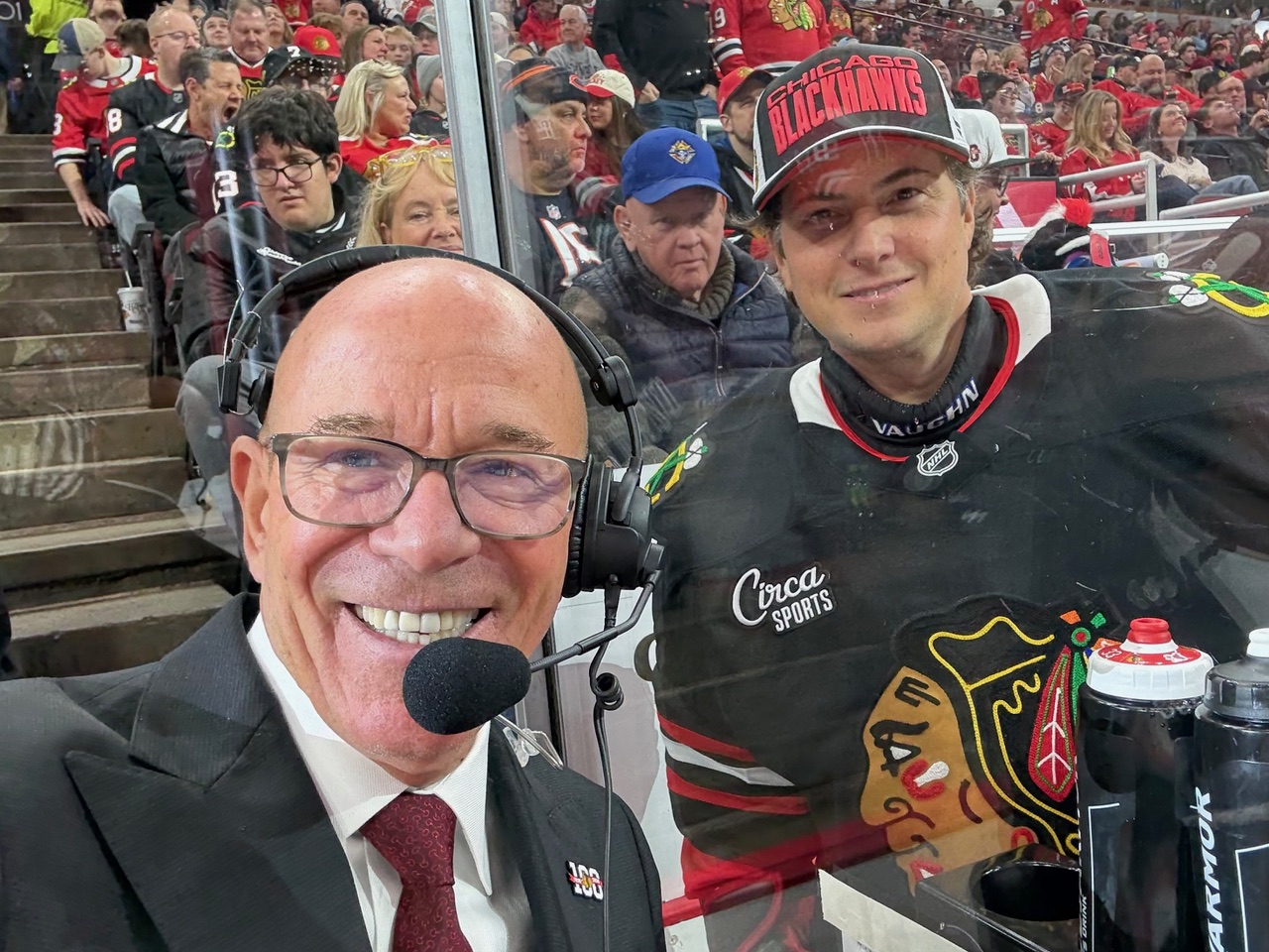 David Nozzolillo poses with broadcaster Darren Pang at the United Center.