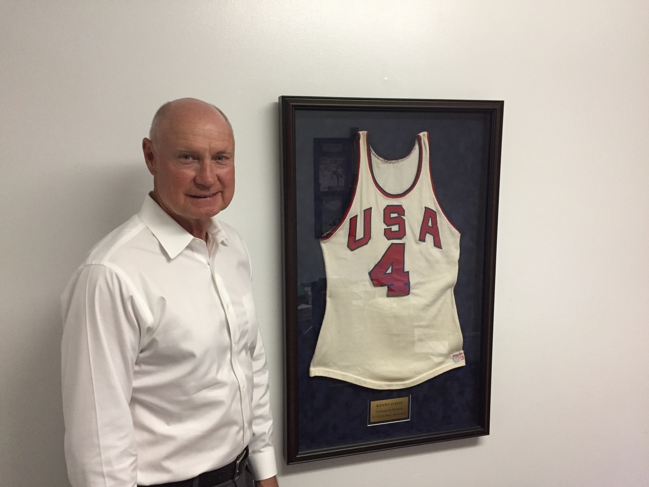Kenny Davis stands by his Olympic jersey