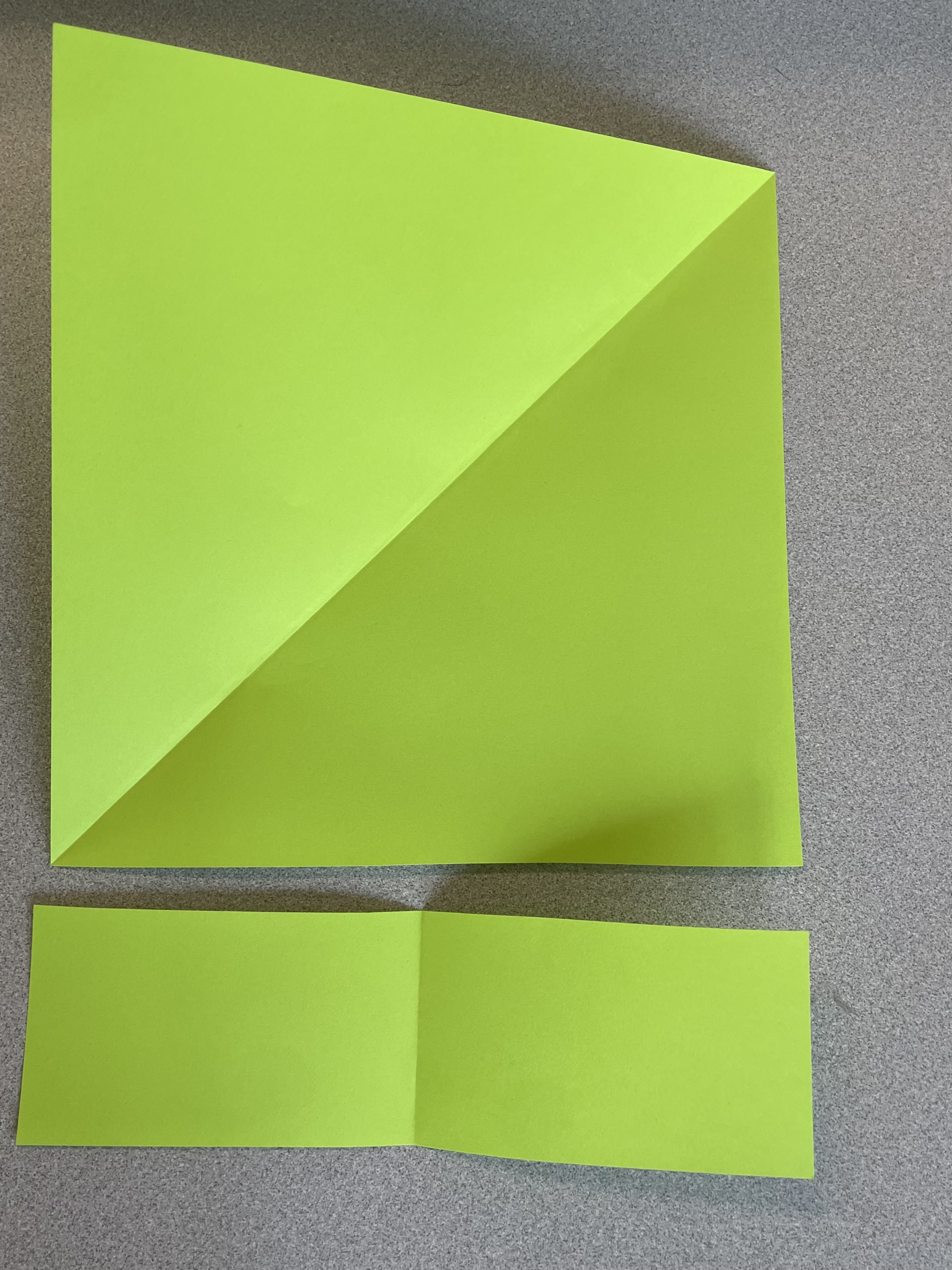 Green squares cut from A4 paper