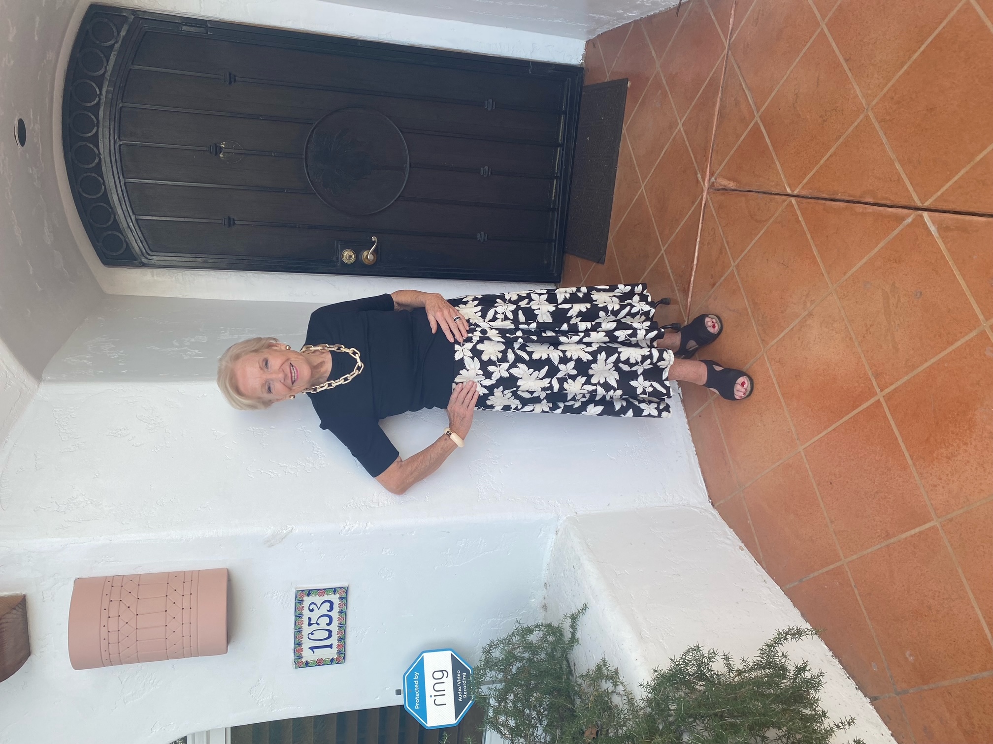 Doris Hart outside her Spanish-style Palm Springs home
