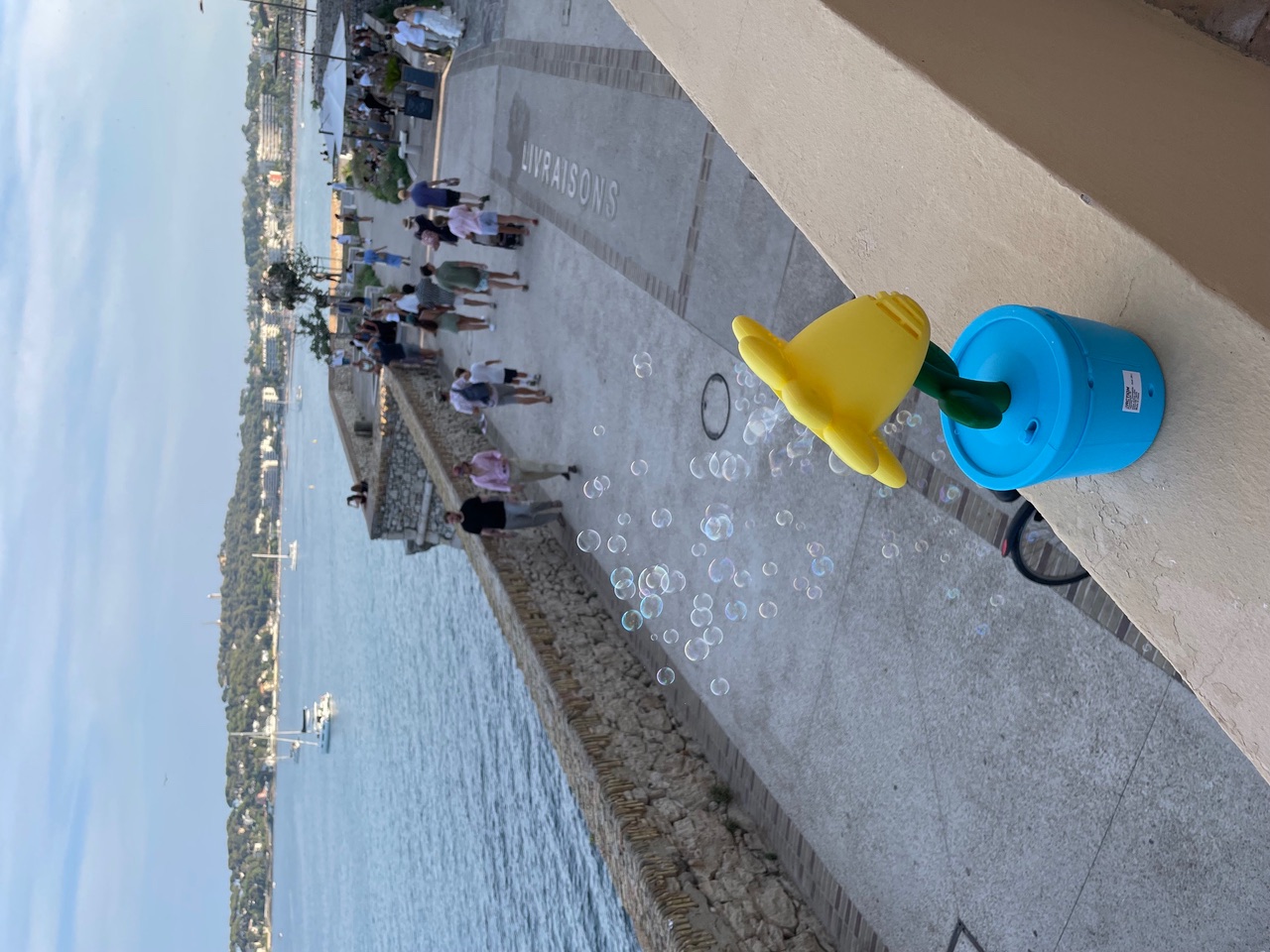 Flower-shaped bubble machine over the ramparts in Antibes