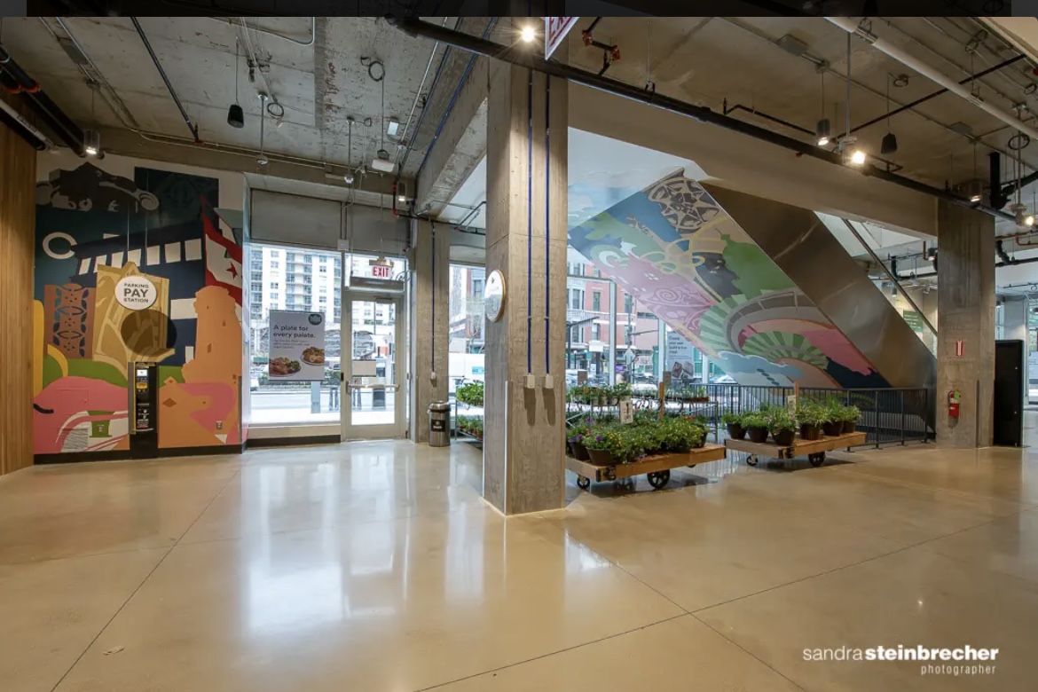 Dorian Sylvain, Kari Blak A view of Chicago and State Whole Foods murals Photo: Sandra Steinbrecher