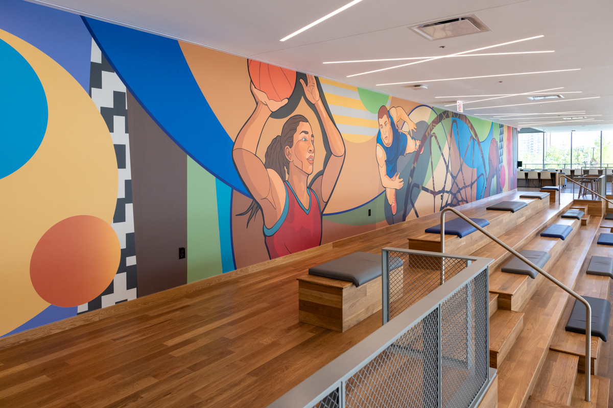 Dorian Sylvain and Sam Kirk A view of “Pass it Forward,” located on two floors of the Main Court space in Home Court. Courtesy Obama Foundation